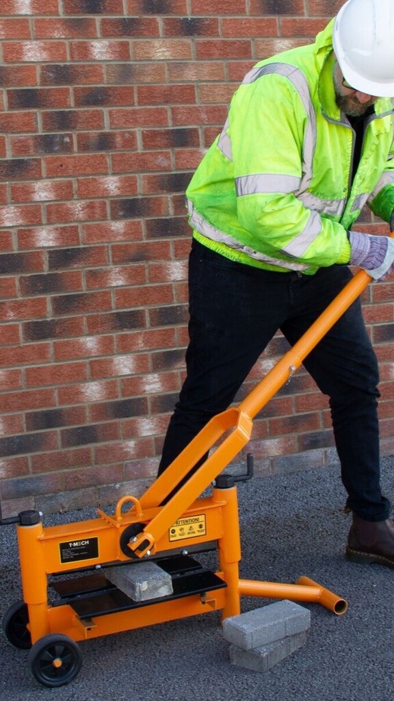 a man in a safety jacket and glasses